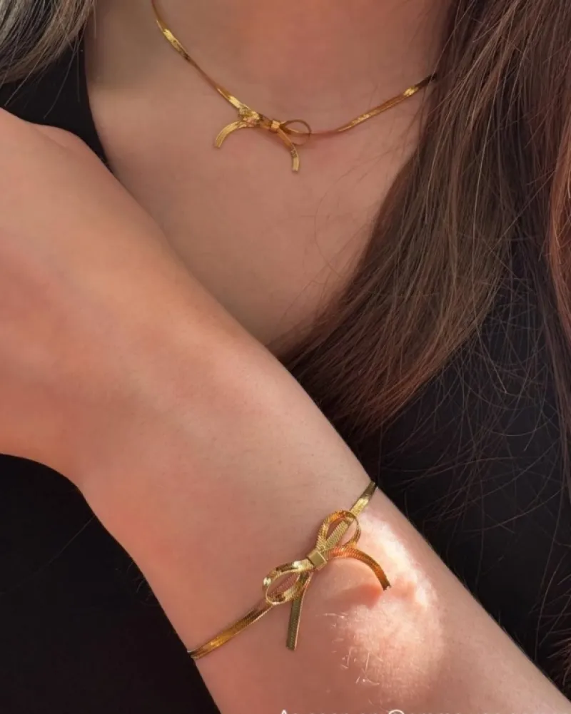 Finaste Armband met trending strikje kleur goud Fashion