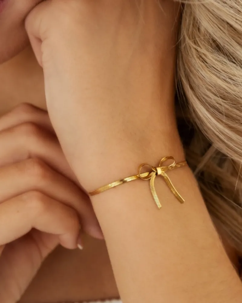 Finaste Armband met trending strikje kleur goud Fashion