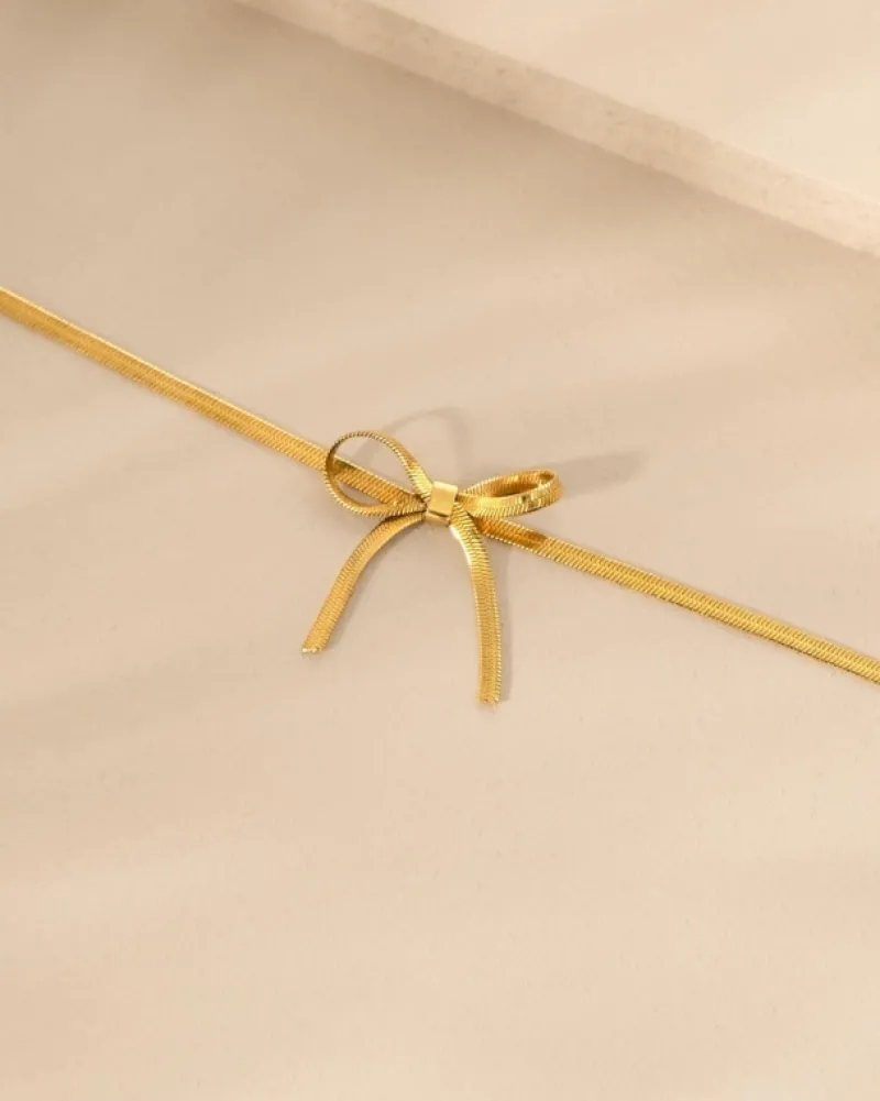 Finaste Armband met trending strikje kleur goud Fashion
