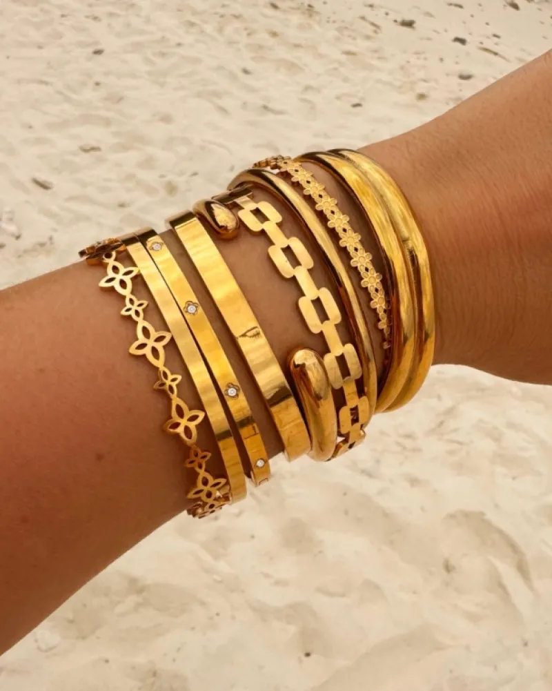 Finaste Bangle met steentjes goudkleurig Clearance