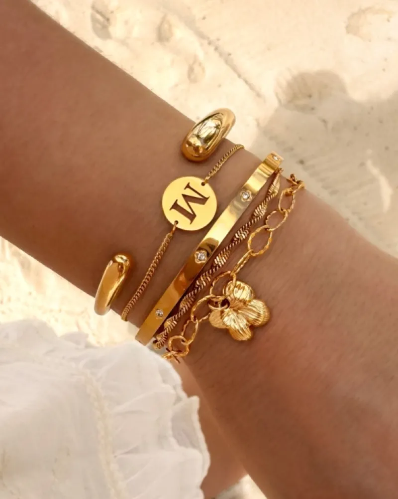 Finaste Bangle met steentjes goudkleurig Clearance