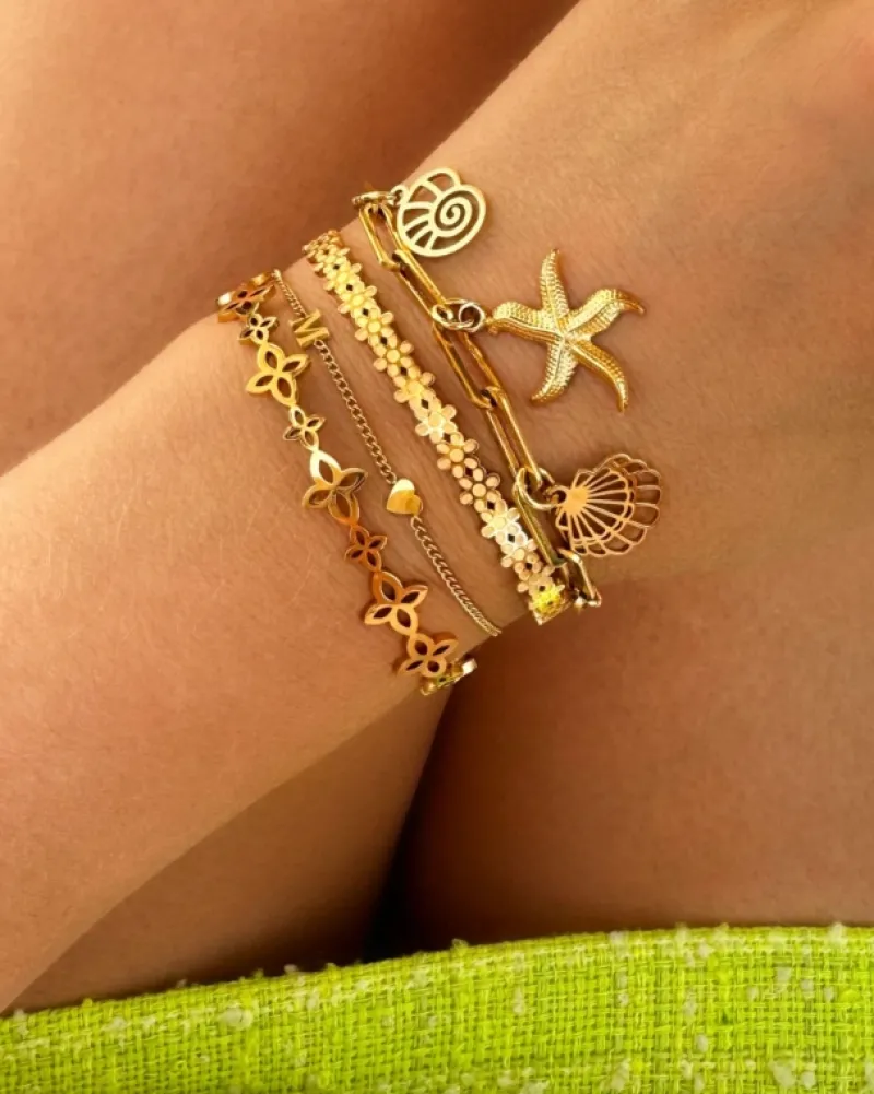 Finaste Bedelarmband zeester goudkleurig Best