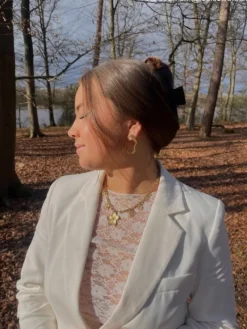 Finaste Bedelketting met bloemetjes goudkleurig Best