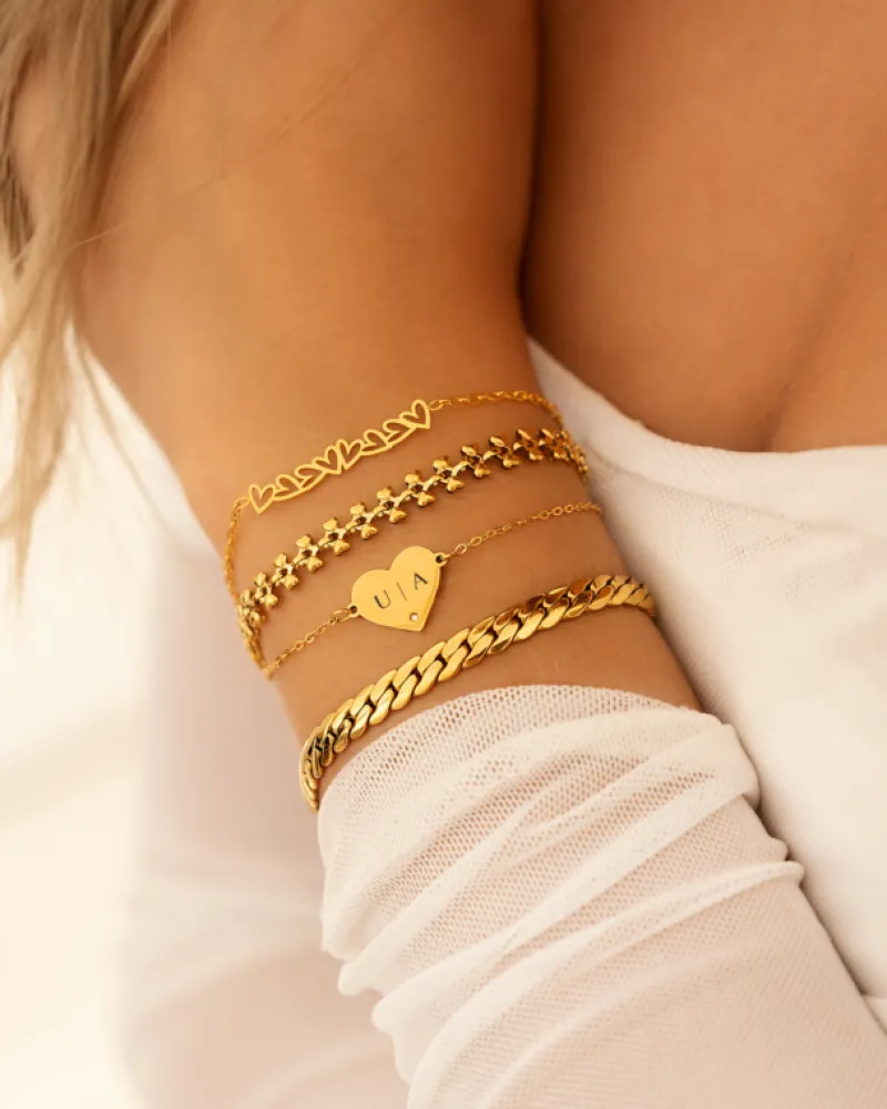 Finaste Bracelet open hearts goldplated Hot