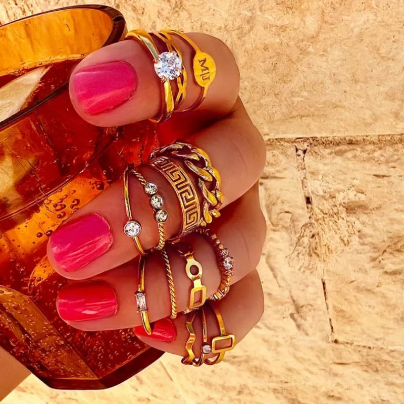 Finaste Gedraaide ring met 3 steentjes goud kleurig Outlet