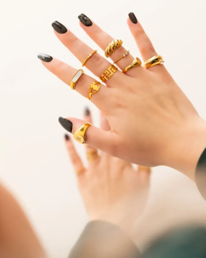 Finaste Gedraaide ring met 3 steentjes goud kleurig Outlet