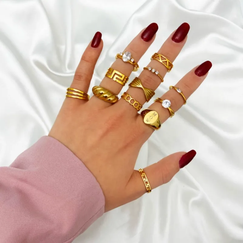 Finaste Gedraaide ring met 3 steentjes goud kleurig Outlet