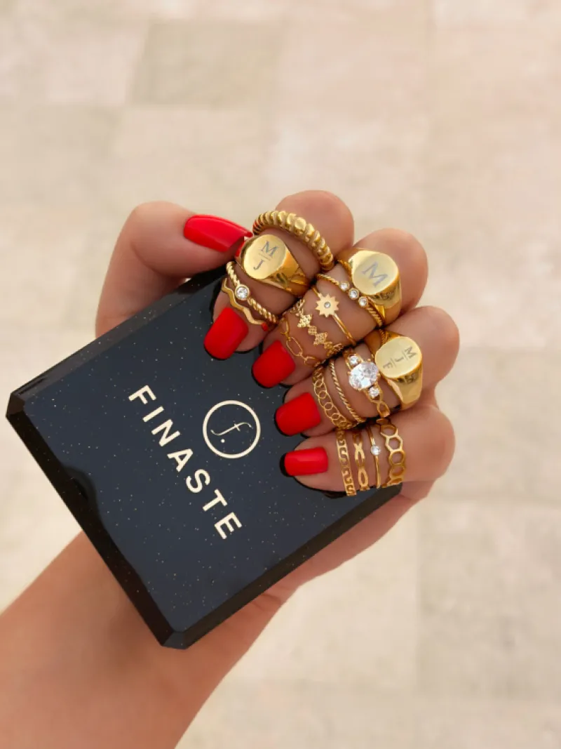Finaste Gedraaide ring met 3 steentjes goud kleurig Outlet