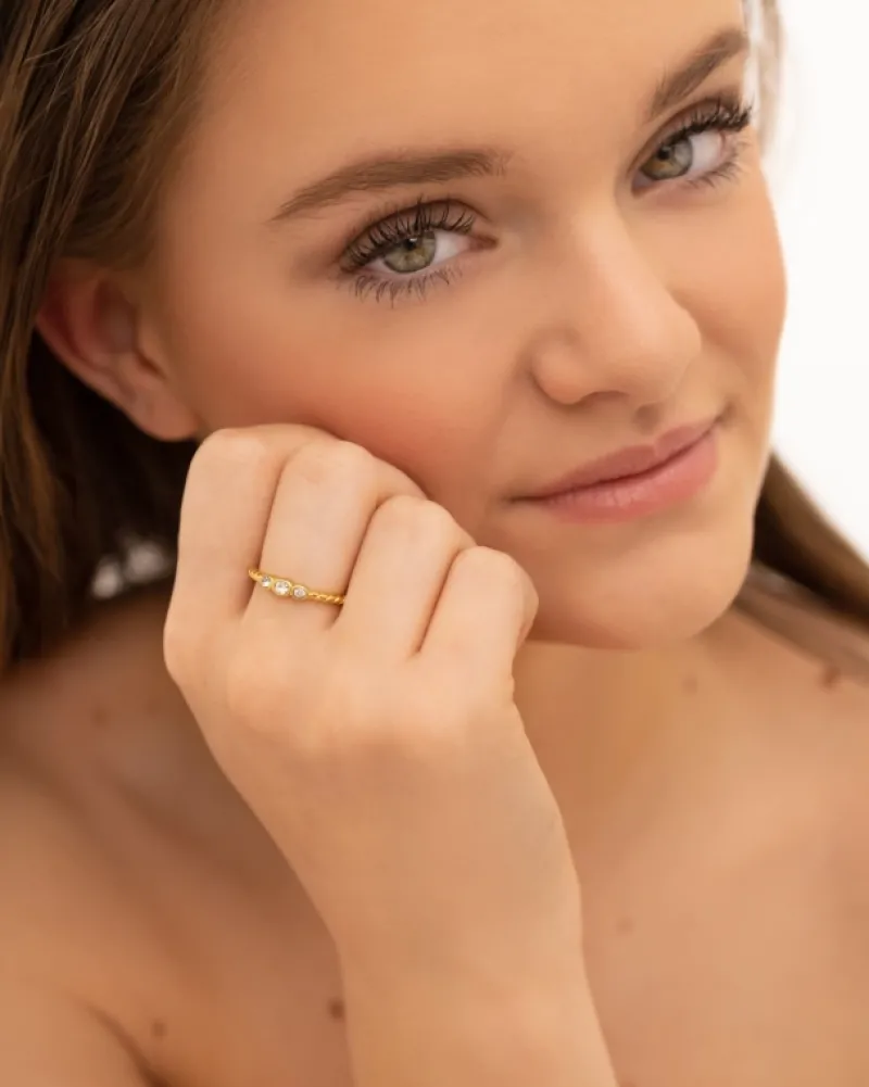 Finaste Gedraaide ring three stones goudkleurig Hot
