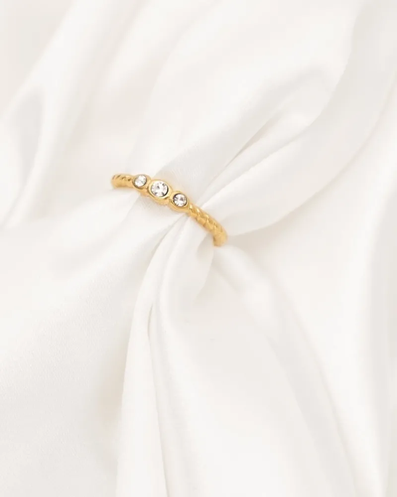 Finaste Gedraaide ring three stones goudkleurig Hot