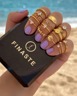 Finaste Gedraaide ring three stones goudkleurig Hot