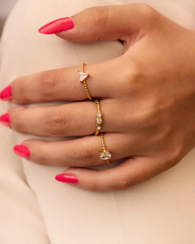 Finaste Gedraaide ring three stones goudkleurig Hot