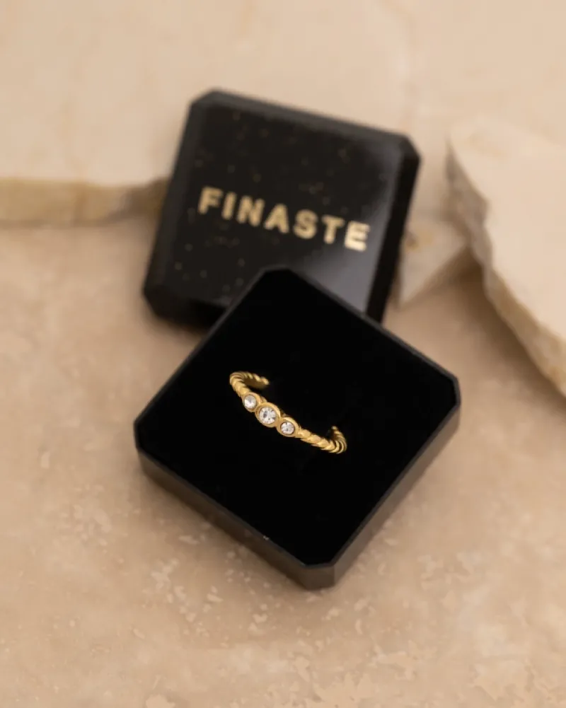 Finaste Gedraaide ring three stones goudkleurig Hot