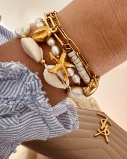 Finaste Gekleurde chain armband met zeester goudkleurig Fashion