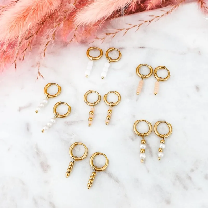 Finaste Goud kleurige oorbellen met roze steentjes Sale