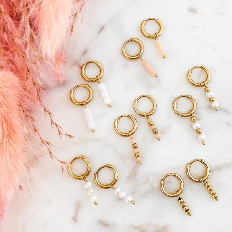 Finaste Goud kleurige oorbellen met roze steentjes Sale