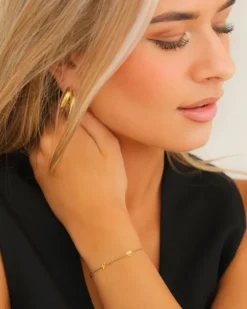 Finaste Mini initial armband met hartje goudkleurig Clearance