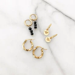 Finaste Oorringetjes met Twist Small Goud kleurig New