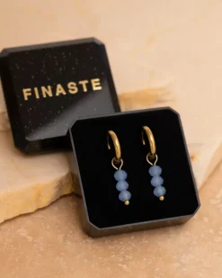 Finaste Oorringetjes round blue stones goudkleurig New