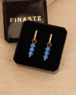 Finaste Oorringetjes round blue stones goudkleurig New