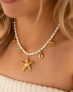 Finaste Parelketting met zeester bedels goudkleurig Hot