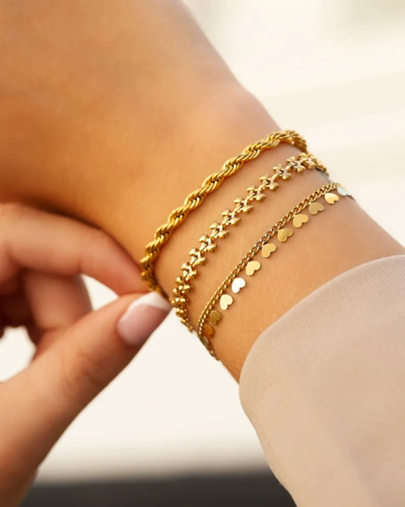 Finaste Schakelarmband gedraaid goudkleurig Best