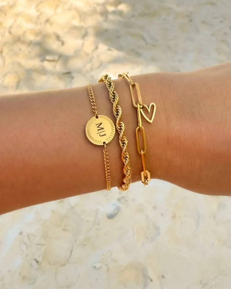 Finaste Schakelarmband gedraaid goudkleurig Best