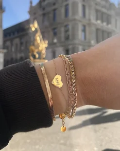 Finaste Schakelarmband gedraaid goudkleurig Best
