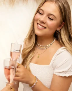 Finaste Schakelarmband gedraaid goudkleurig Best