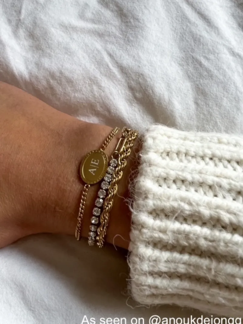 Finaste Schakelarmband gedraaid goudkleurig Best