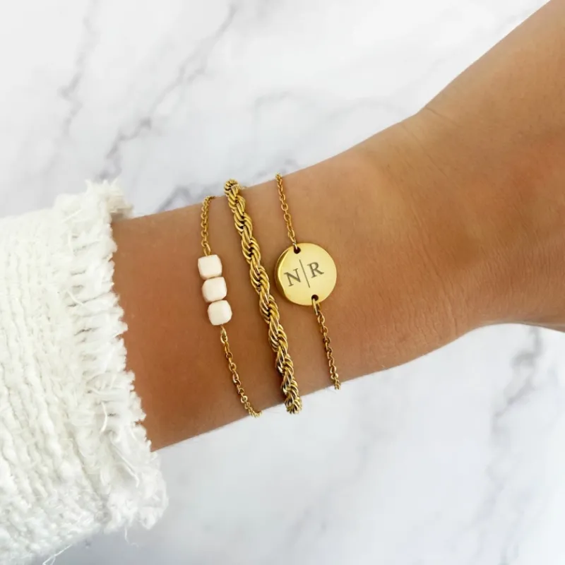 Finaste Schakelarmband gedraaid goudkleurig Best