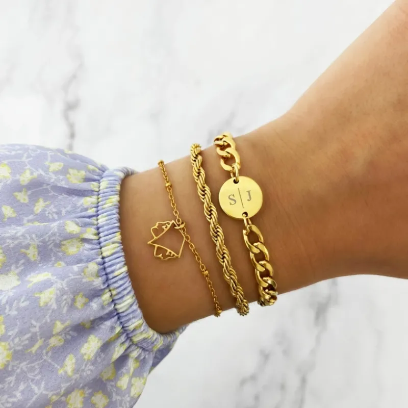 Finaste Schakelarmband gedraaid goudkleurig Best