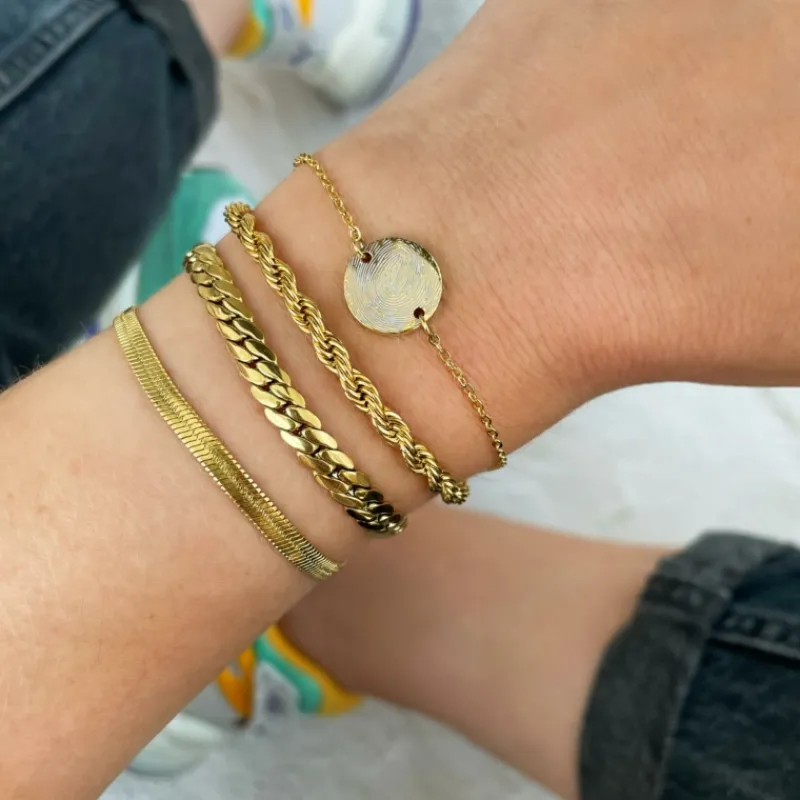 Finaste Schakelarmband gedraaid goudkleurig Best