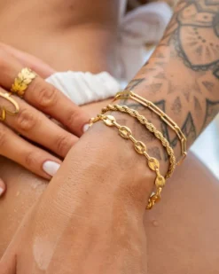 Finaste Schakelarmband gedraaid goudkleurig Best