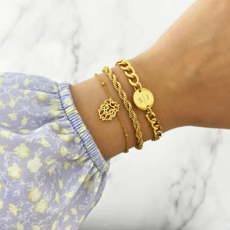 Finaste Schakelarmband gedraaid goudkleurig Best