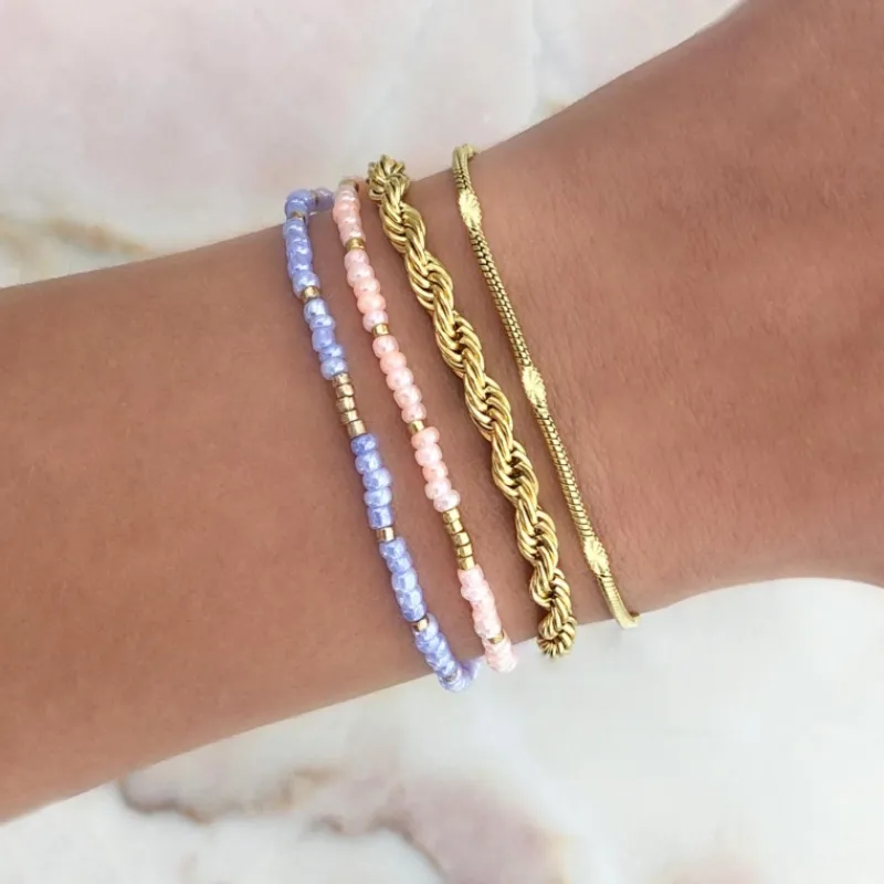 Finaste Schakelarmband gedraaid goudkleurig Best