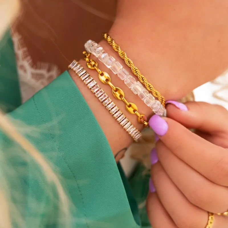 Finaste Schakelarmband gedraaid goudkleurig Best