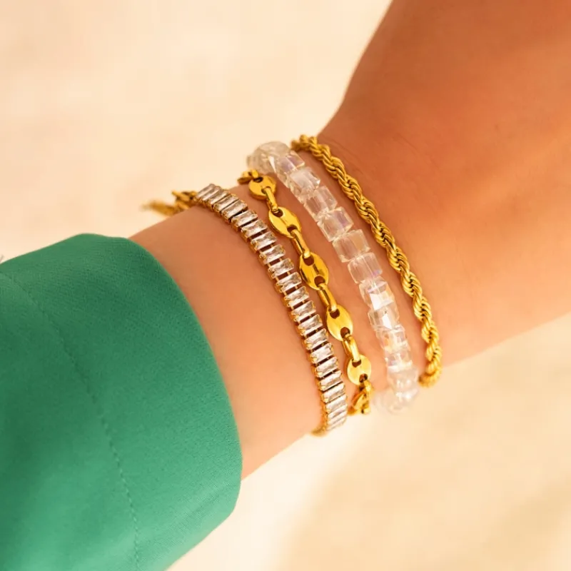 Finaste Schakelarmband gedraaid goudkleurig Best