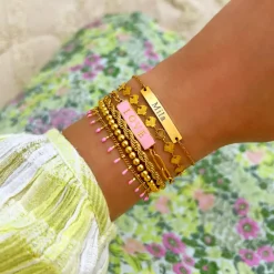 Finaste Schakelarmband gedraaid goudkleurig Best