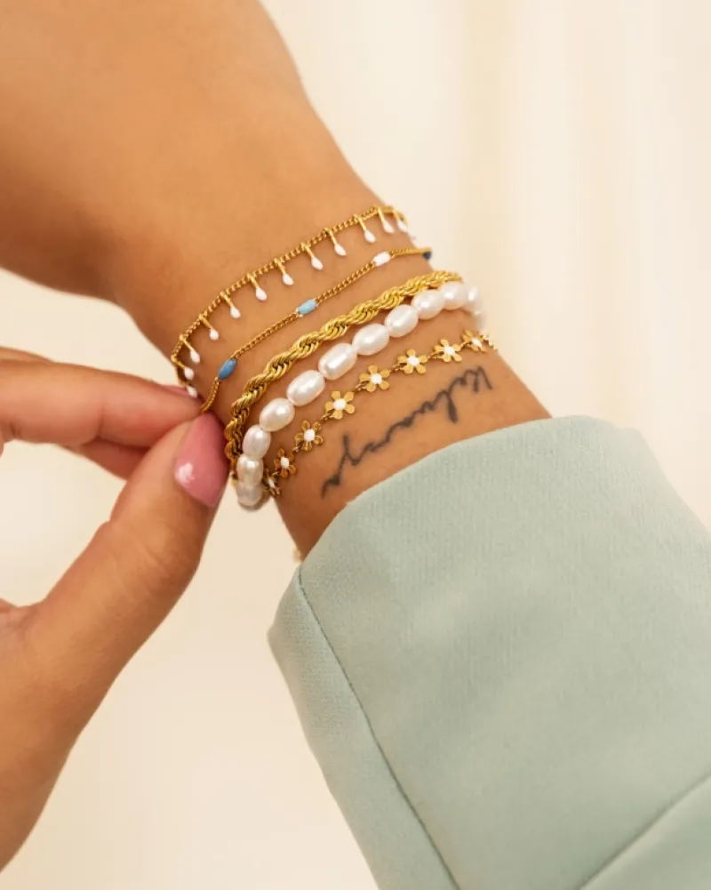 Finaste Schakelarmband gedraaid goudkleurig Best
