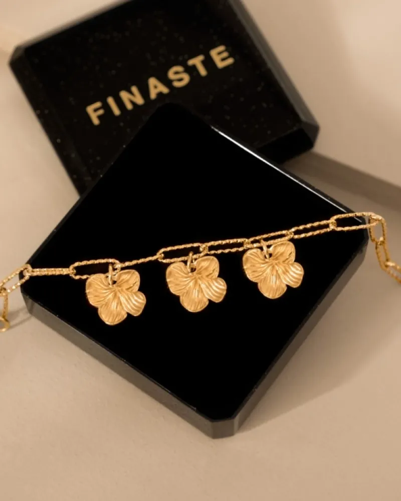 Finaste Schakelarmband met bloemetjes goudkleurig Discount