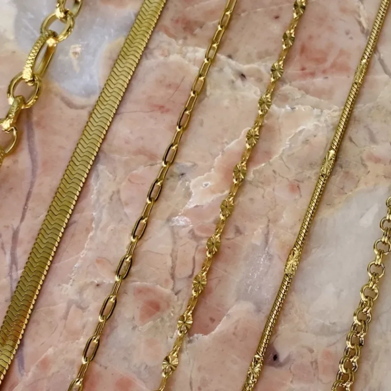 Finaste Schakelarmband mix goud kleurig Fashion