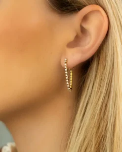 Finaste Tennis oorbellen met kettinkje goud kleurig New