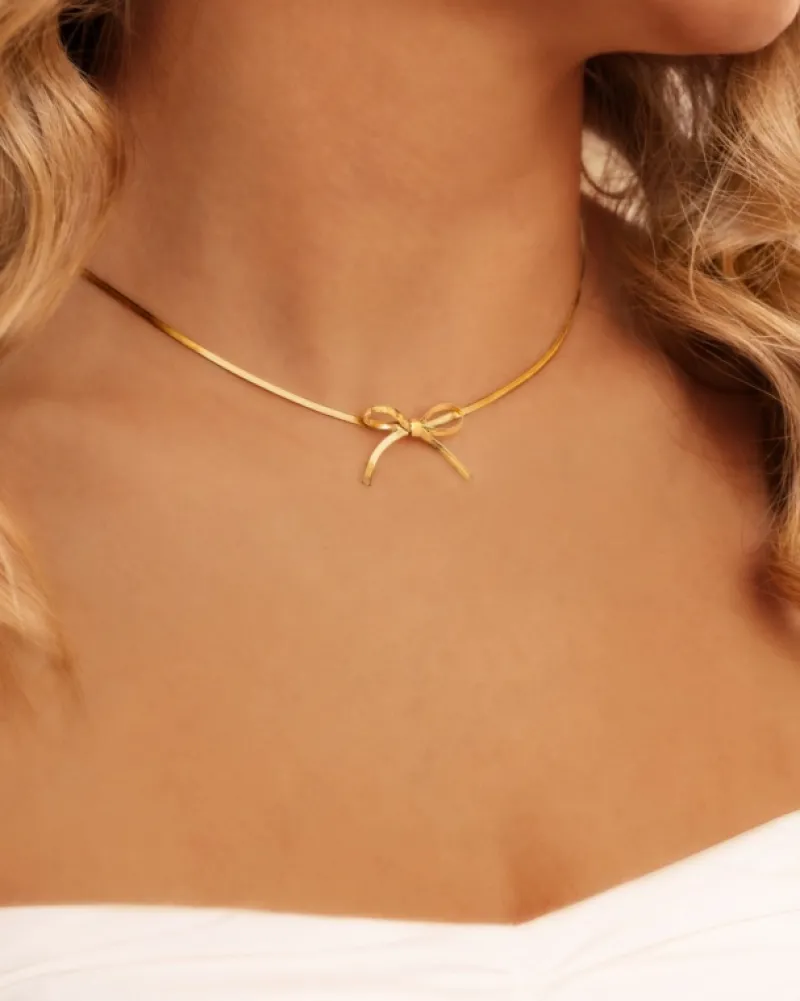 Finaste Trendy bow necklace goudkleurig Discount