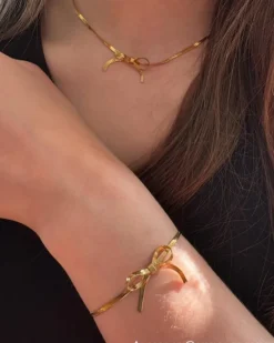 Finaste Trendy bow necklace goudkleurig Discount