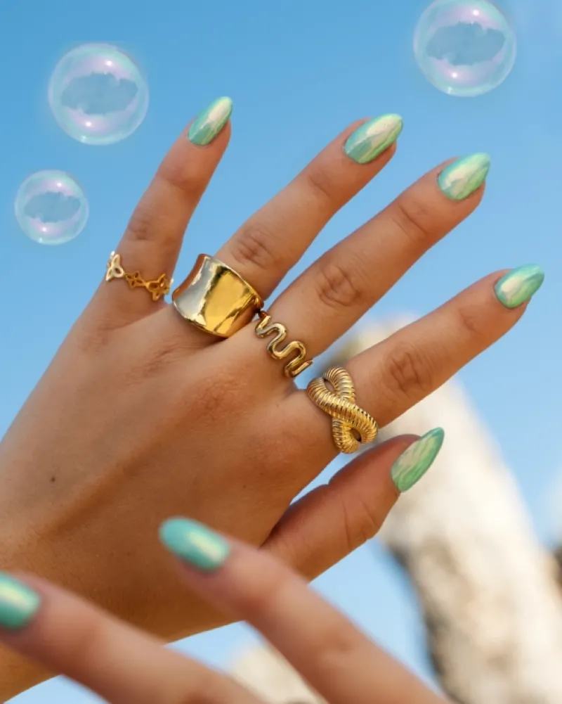 Finaste Verstelbare ring met golven goudkleurig Clearance